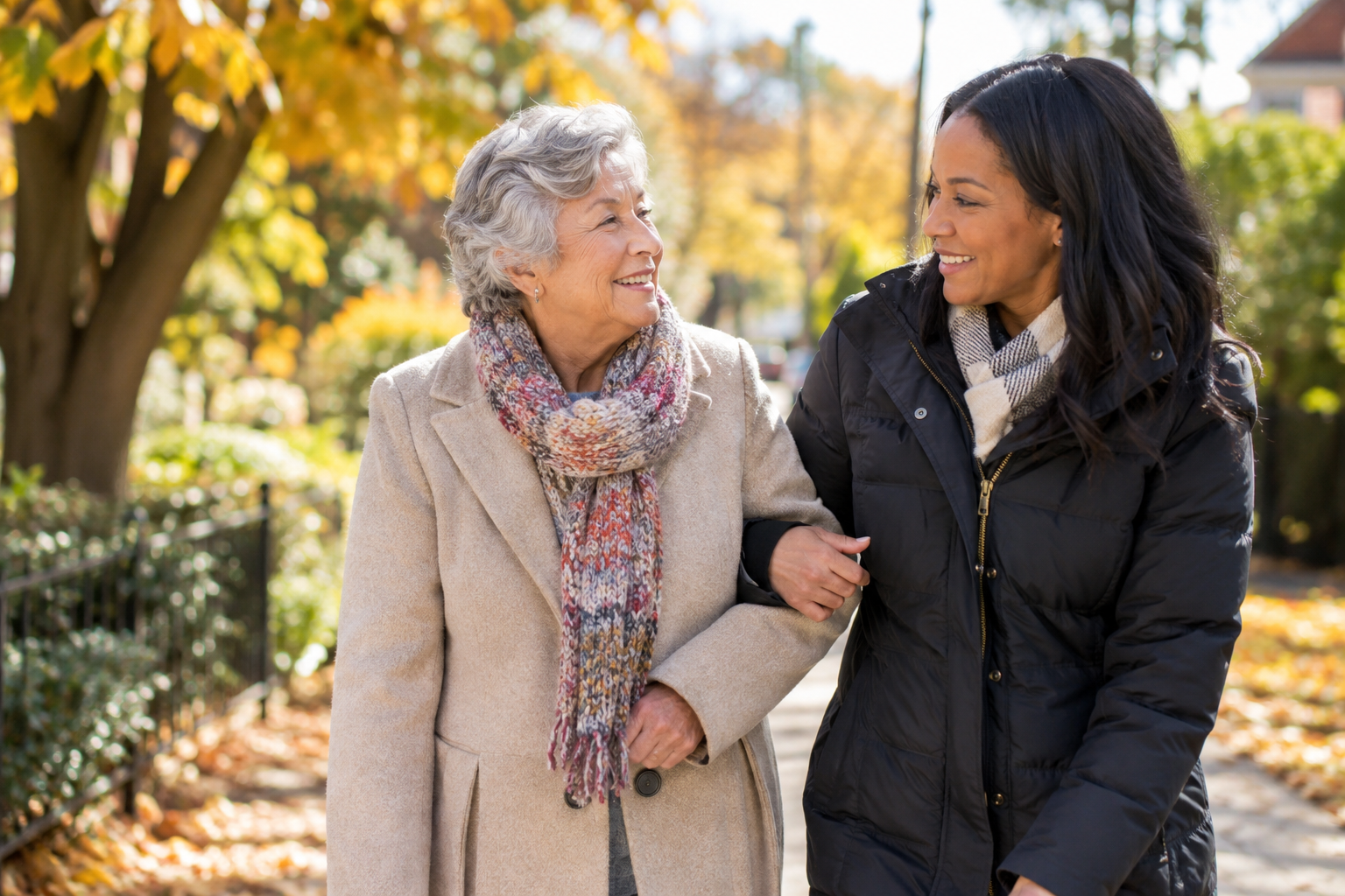 Older adult receiving home companionship and support during fall season.